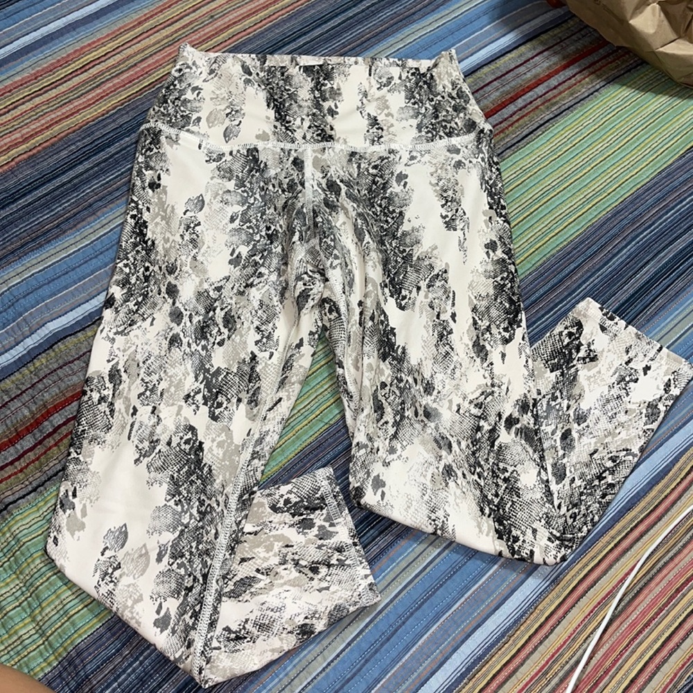 Evolution and Creation snake print regular length leggings.